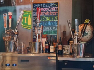 Totem draft beer and wine bottles.