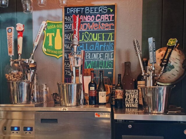 Totem draft beer and wine bottles.